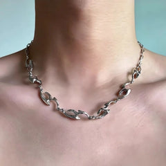 Irregular Shaped Metal Necklace On The Street